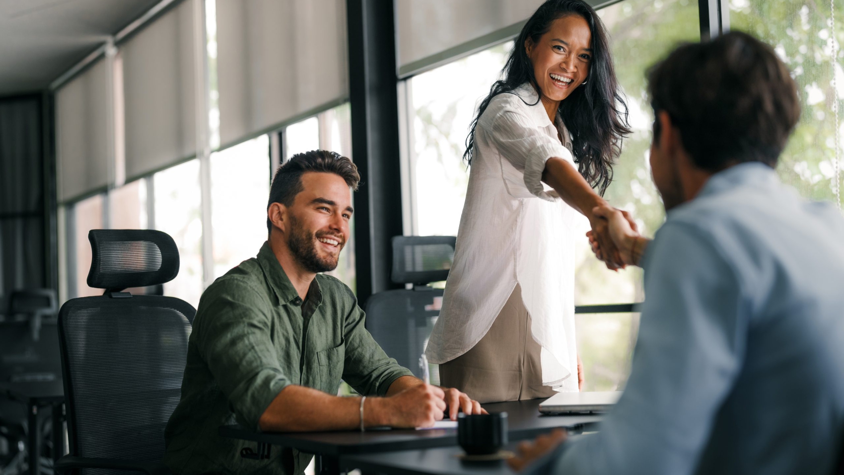 Business people, handshake for agreement, b2b deal and cooperation for project. Shaking hands, contract and employees with teamwork, greeting and thank you for promotion and negotiation